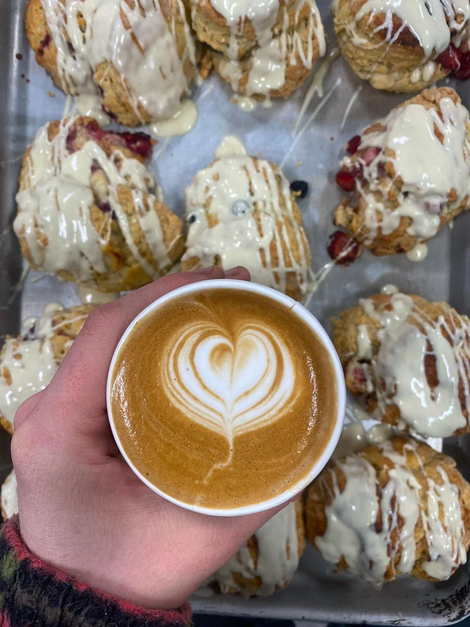 Fresh scones with latte art coffee